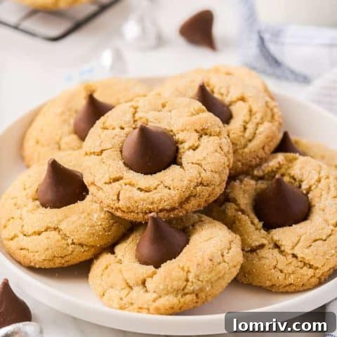 Classic peanut butter blossom cookies with a distinct chocolate kiss in the center.