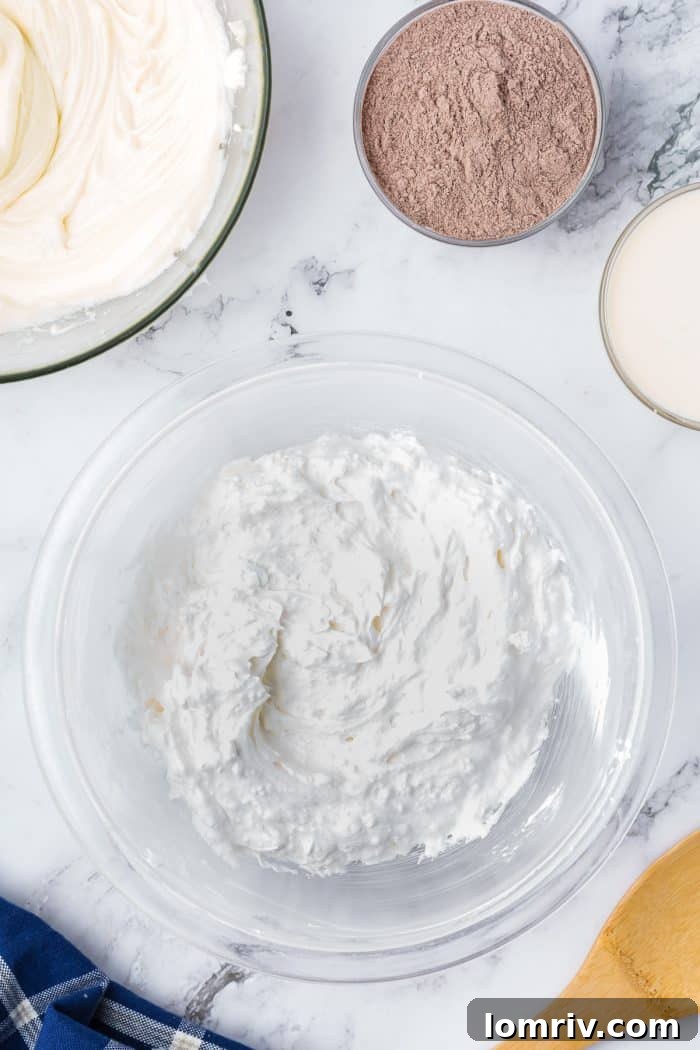 Powdered sugar mixed with cool whip.