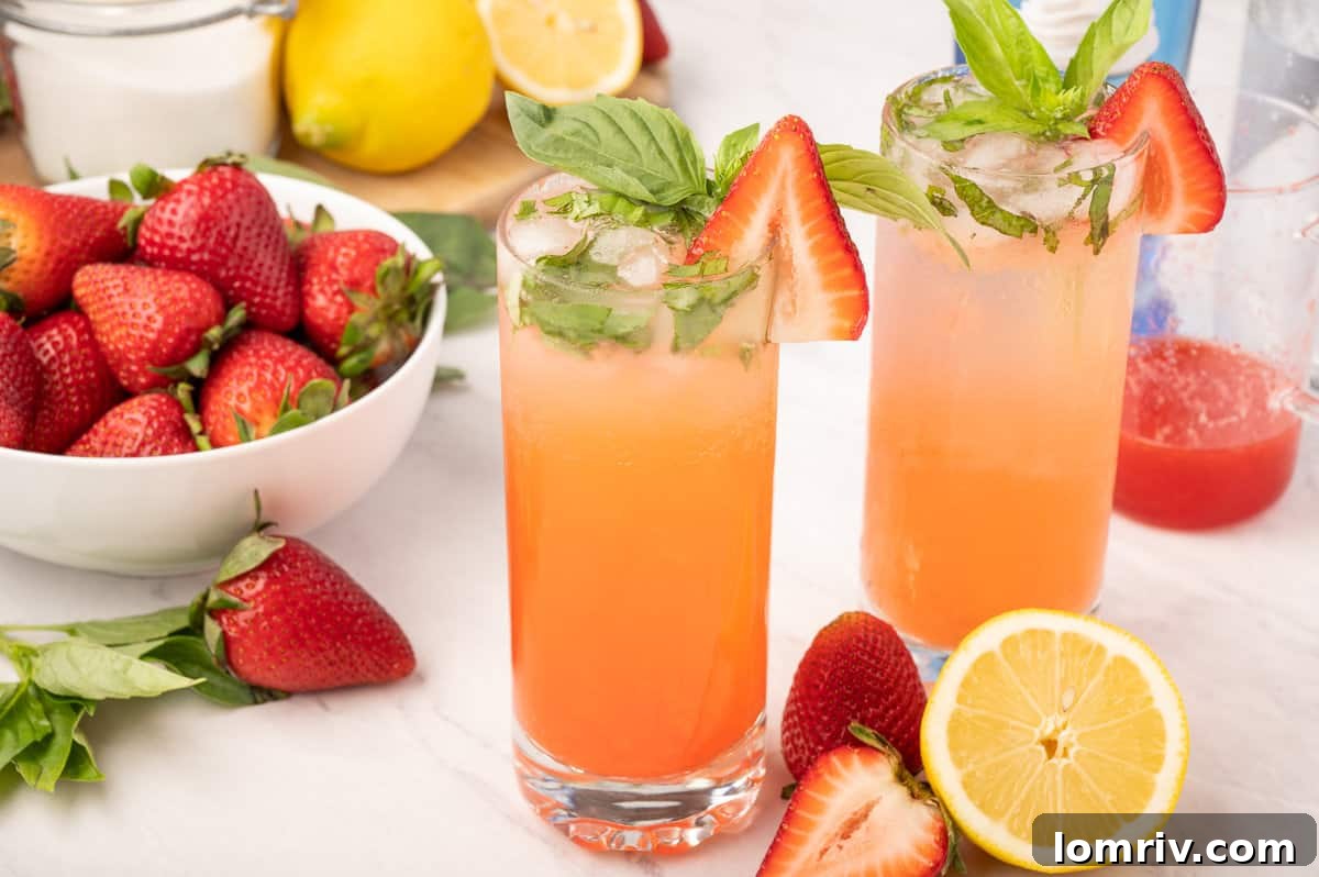 Ingredients for a Strawberry Basil Sparkler laid out on a table