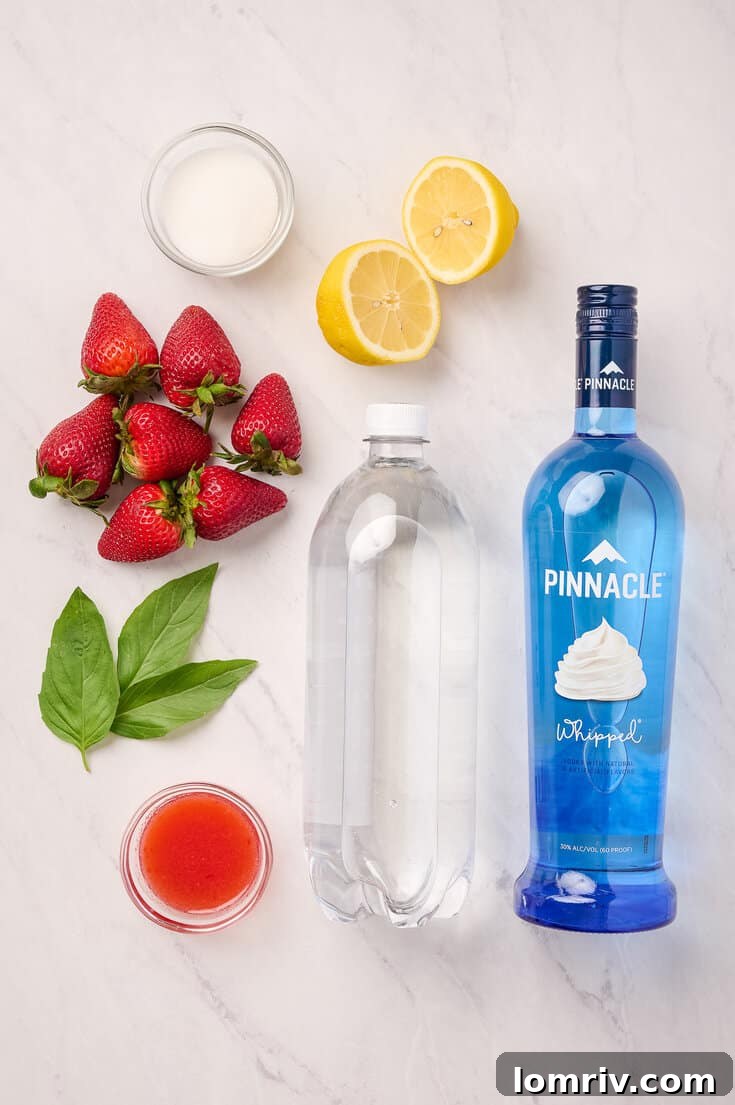 Hand muddling strawberries and sugar for simple syrup