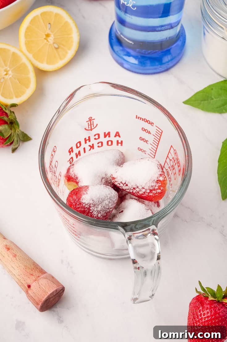 Straining strawberry syrup
