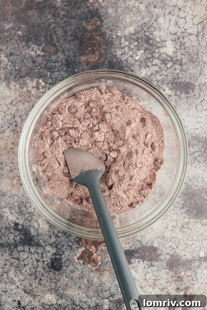 The  dry ingredients in a glass bowl.