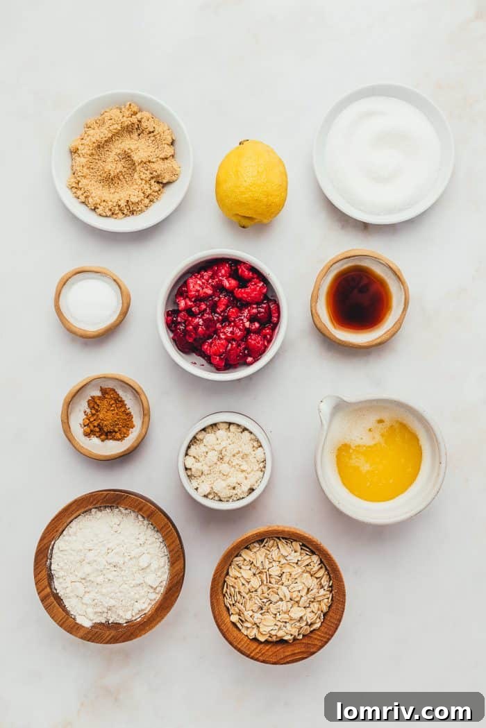 The ingredients for raspberry crumble bars in bowls.