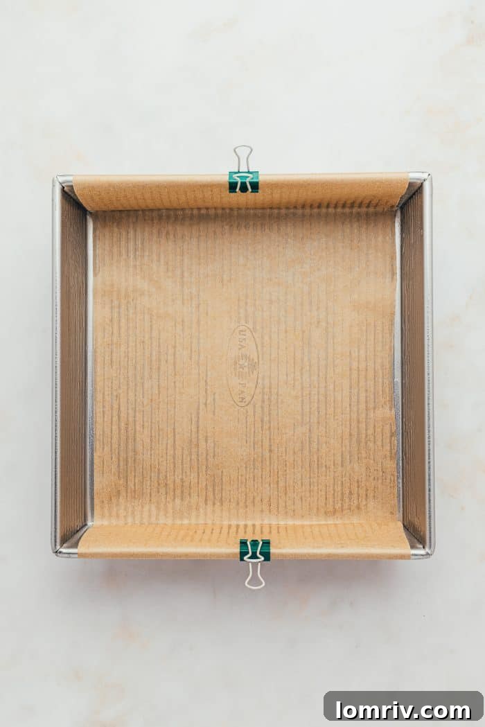 A baking tray lined with parchment paper.