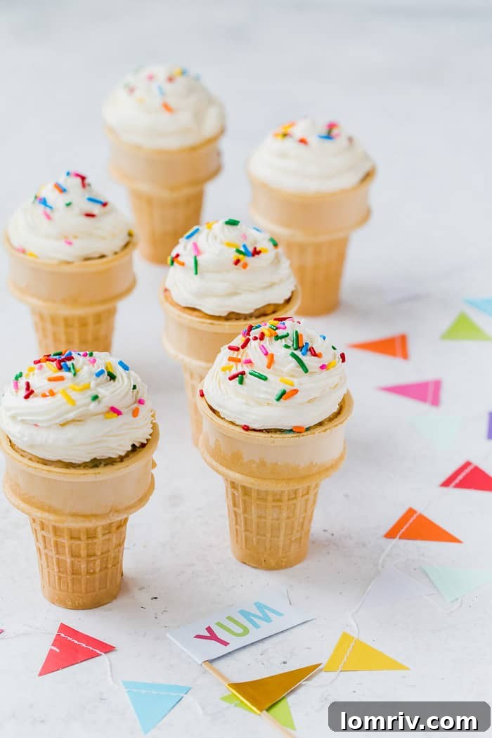Delicious Funfetti Ice Cream Cone Cupcakes topped with sprinkles