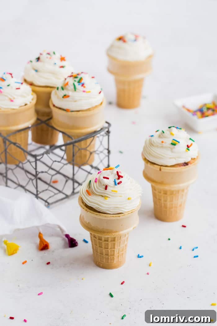 Close-up of Funfetti Ice Cream Cone Cupcakes with creamy frosting