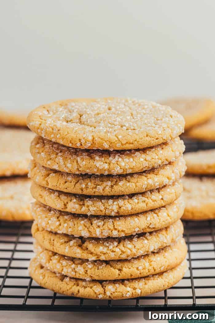 A cooling rack with various browned butter sugar cookies.
