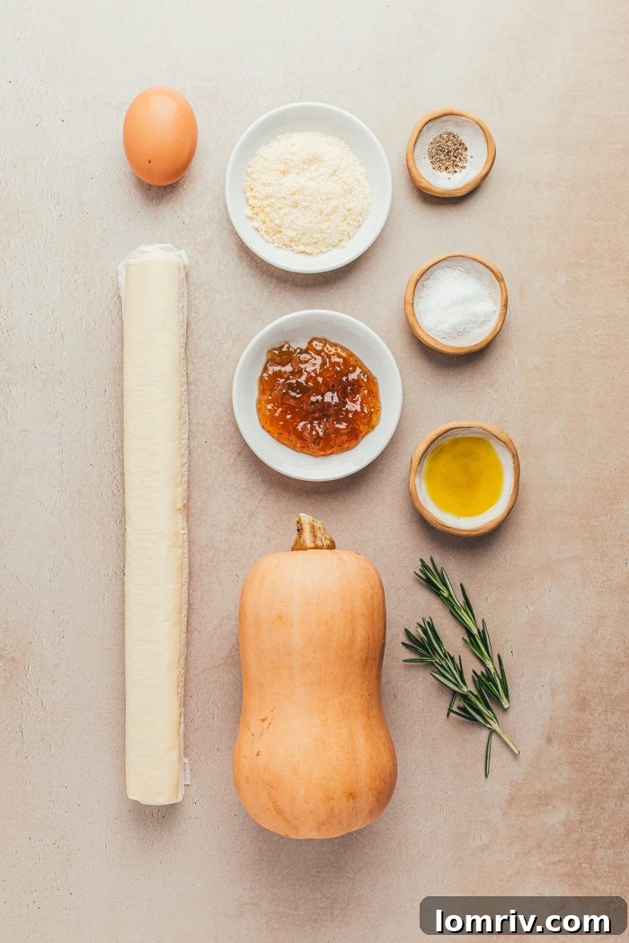 All the fresh ingredients meticulously laid out for making an easy butternut squash tart.