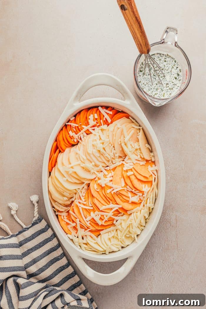 Heavy cream, minced garlic, and fresh herbs whisked in a bowl