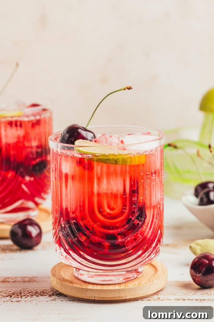 Two virgin cherry Moscow mules in glass cups.