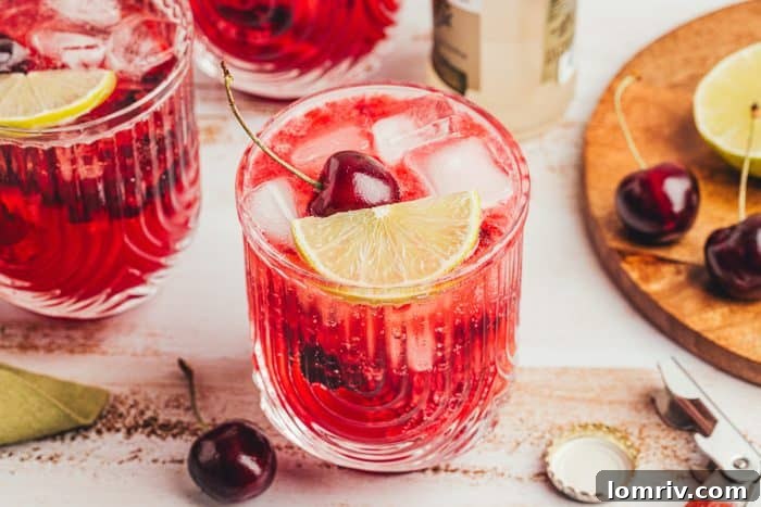 Two virgin cherry Moscow mules in glass cups.
