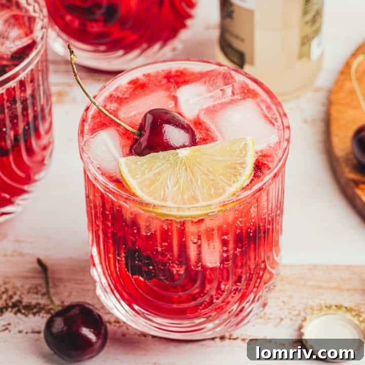 Two virgin cherry Moscow mules in glass cups.