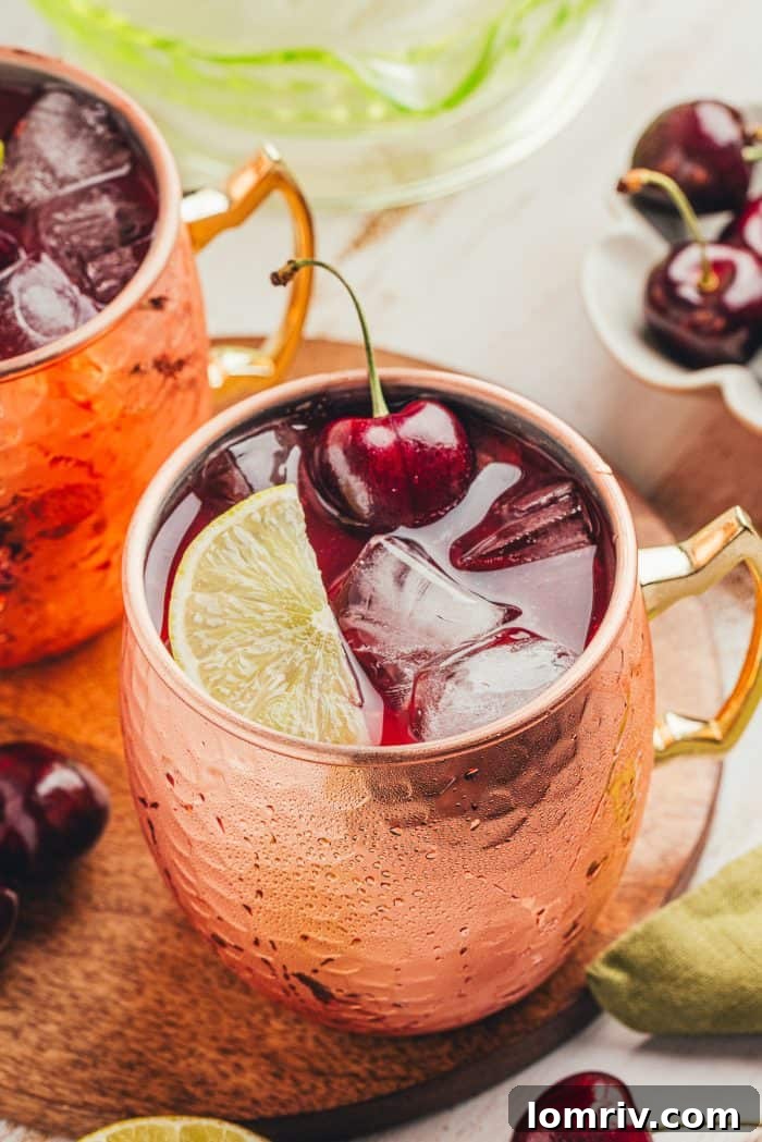 A virgin cherry Moscow mule in a copper cup.