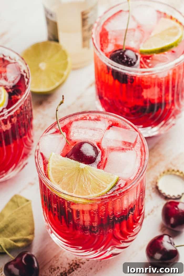 Two virgin cherry Moscow mules in glass cups.
