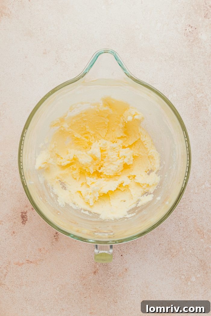 Creamed butter and sugar, light and fluffy, in the bowl of a stand mixer.