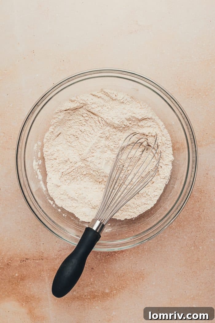 The dry ingredients mixed in a glass bowl.