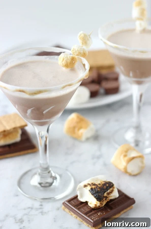 S'mores Martini in a glass with toasted marshmallows