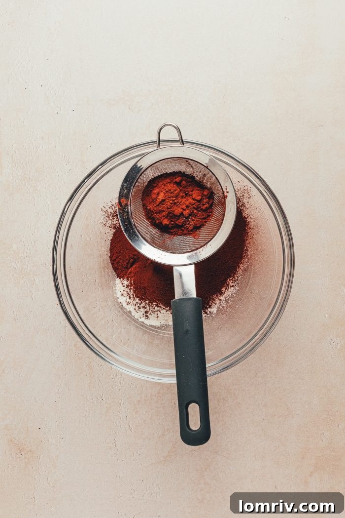 Sift the cocoa powder and flour into a glass bowl.