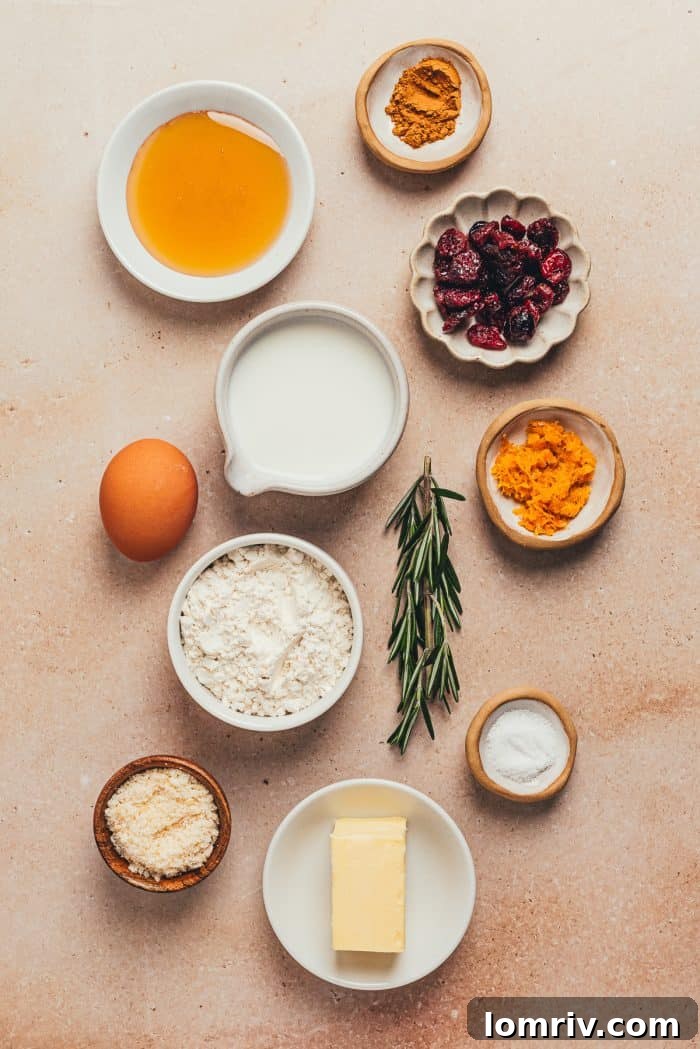 Very ingredients for rosemary popovers in bowls.