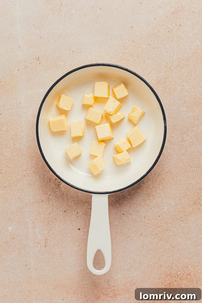 Cubed butter in a saucepan.