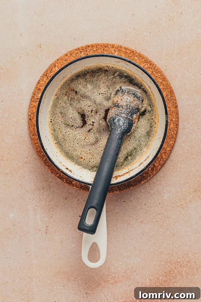 A saucepan with brown butter.