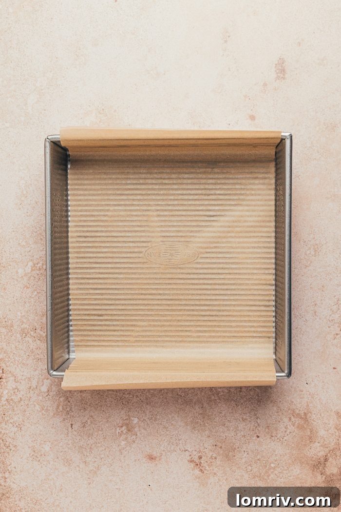 A baking pan with parchment paper.