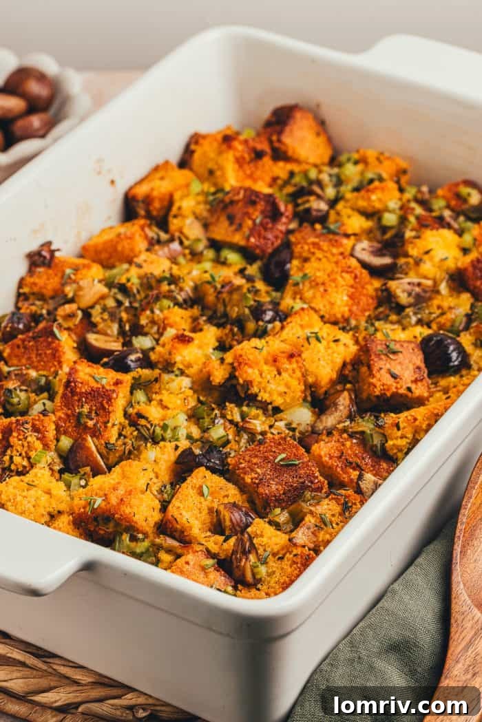 A white rectangle baking dish with baked stuffing.