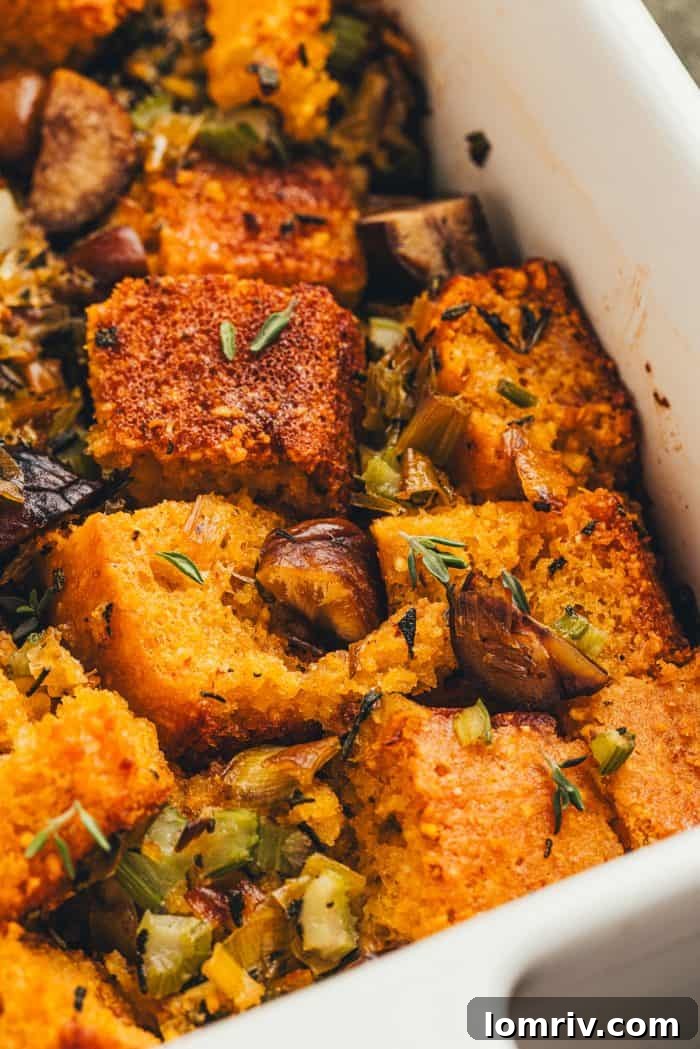 A white baking dish with homemade cornbread stuffing.