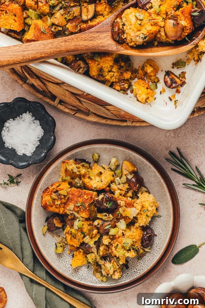 A small plate with a serving of stuffing made with cornbread.