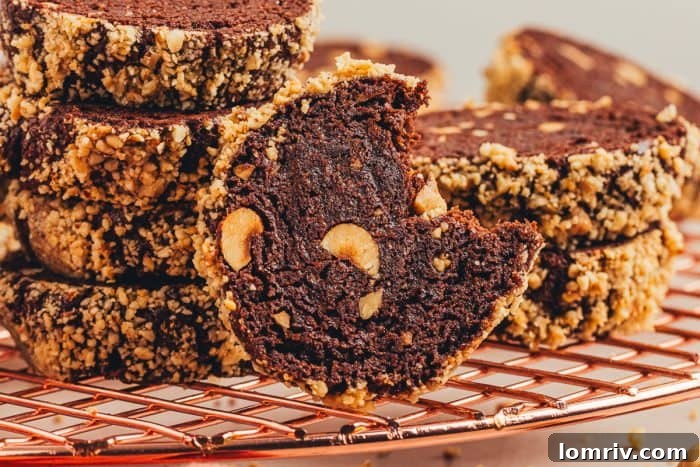 A final close-up of chocolate hazelnut shortbread cookies on a cooling rack, showing off their texture.
