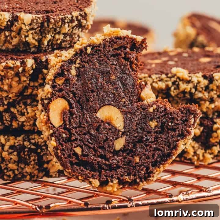 Chocolate hazelnut shortbread cookies on a cooling rack.