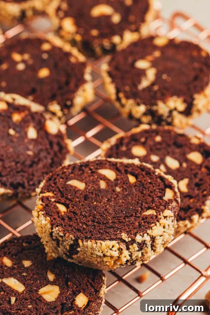 Warm chocolate hazelnut espresso cookies arranged beautifully on a cooling rack.