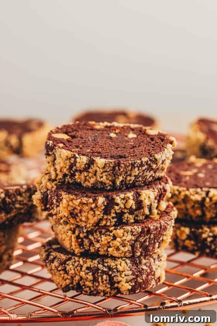 Freshly baked chocolate hazelnut slice and bake cookies cooling on a wire rack, ready to be enjoyed.