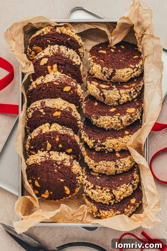 Close-up of a festive holiday cookie box featuring chocolate hazelnut espresso cookies.