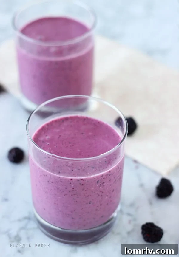 A healthy and filling black raspberry smoothie with a protein boosting secret ingredient!