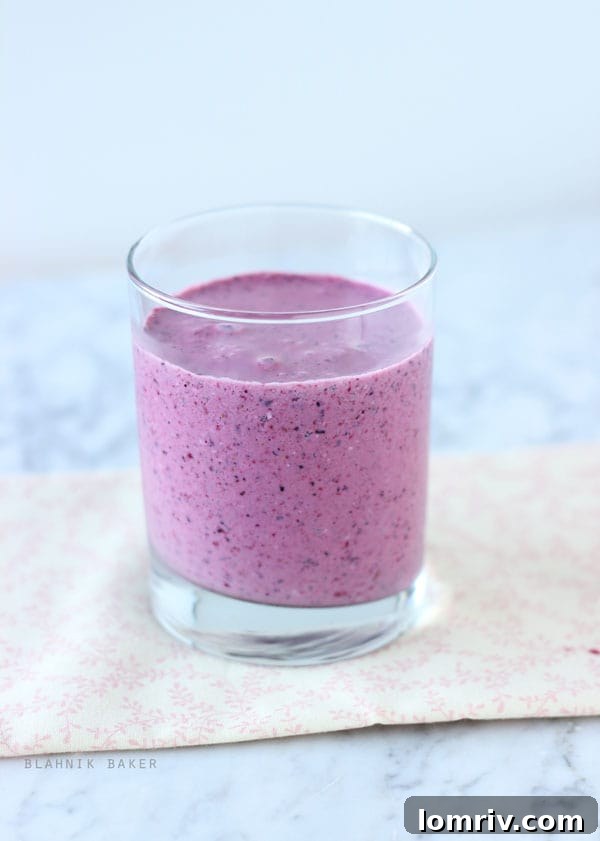 A healthy and filling black raspberry smoothie with a protein boosting secret ingredient!