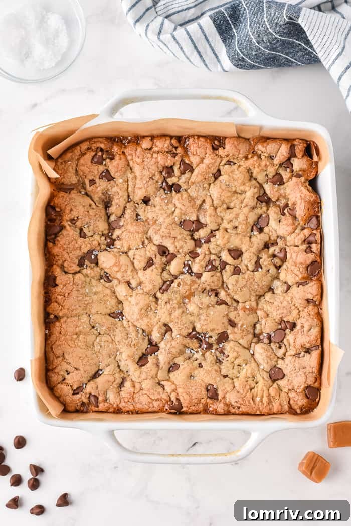Salted Caramel Chocolate Chip Cookie Bars baking in the oven