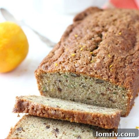 Close-up of freshly baked Orange Zucchini Bread with a golden crust