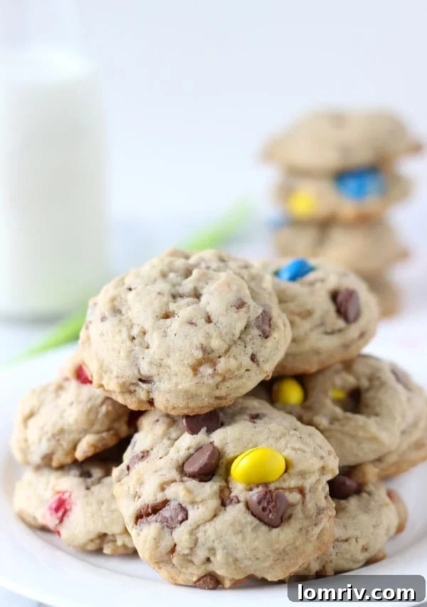 Deliciously soft Spiced M&M Toffee Cookies with festive M&M candies and crunchy toffee bits