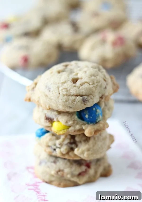 A final shot of Spiced M&M Toffee Cookies cooling on a wire rack, ready to be enjoyed