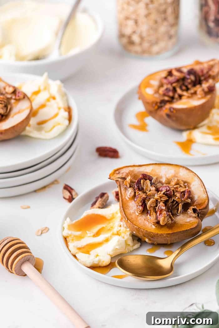 Baked pears on a plate with mascarpone cheese and honey, ready to eat