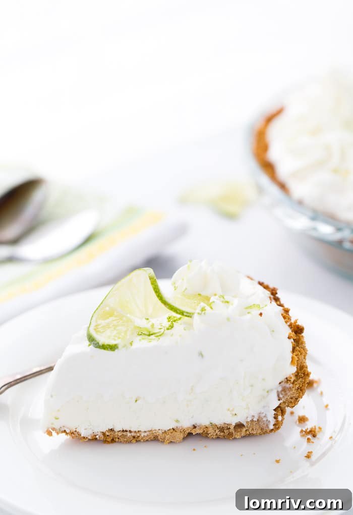 This no bake frozen margarita pie recipe is sweet, tangy and refreshing. Creamy cream cheese and tart lime juice in the perfect summer pie. 