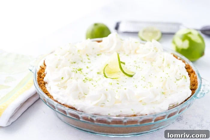 This no bake frozen margarita pie recipe is sweet, tangy and refreshing. Creamy cream cheese and tart lime juice in the perfect summer pie. 