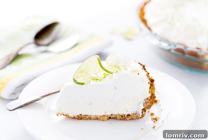 This no bake frozen margarita pie recipe is sweet, tangy and refreshing. Creamy cream cheese and tart lime juice in the perfect summer pie. 