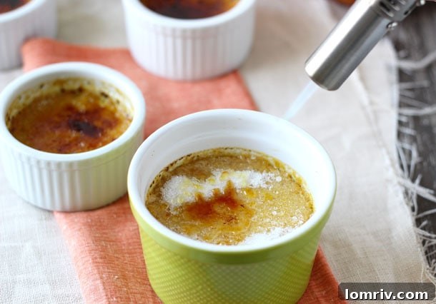 Ramekins filled with Pumpkin Maple Creme Brulee custard, ready for chilling before caramelization.