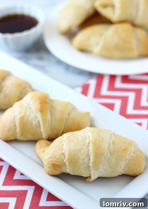 Pillsbury Crescent rolls prepared with apple and goat cheese filling, ready to be rolled and baked