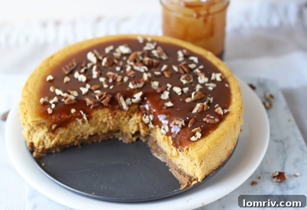 Pumpkin Pecan Cheesecake with Salted Caramel Sauce