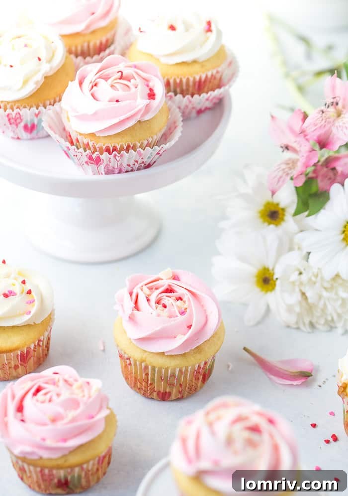 The process of making White Chocolate Rose Cupcakes, showing the batter in cupcake liners before baking.