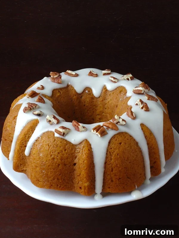 Pumpkin Bundt Cake with Bourbon Cream Cheese Glaze