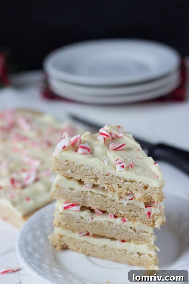 Peppermint Spiced Cookie Bark cut into elegant triangular pieces, ready for serving or packaging.